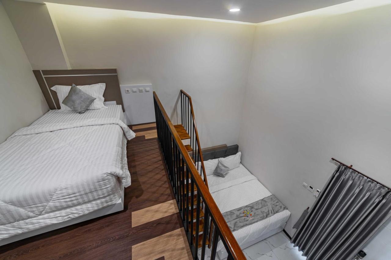 Tree Homestay Mitra Reddoorz Kasri Buitenkant foto
